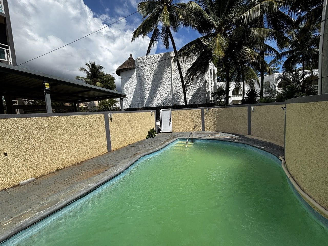 TROU AUX BICHES – APPARTEMENT AVEC VÉRANDA & PISCINE COLLECTIVE À 5MN À PIED DE LA PLAGE - Photo 4
